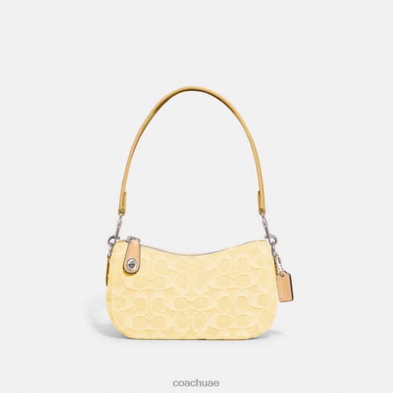 Coach نحيف سوينجر 20 من الدنيم المميز ل / أصفر شاحب 46266200